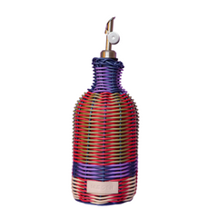 Decorative oil bottle with colorful woven design on a purple background